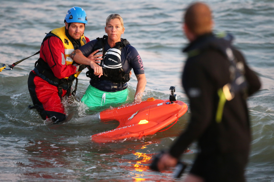 woman rescued by remote control lifebuoy Dolphin 1