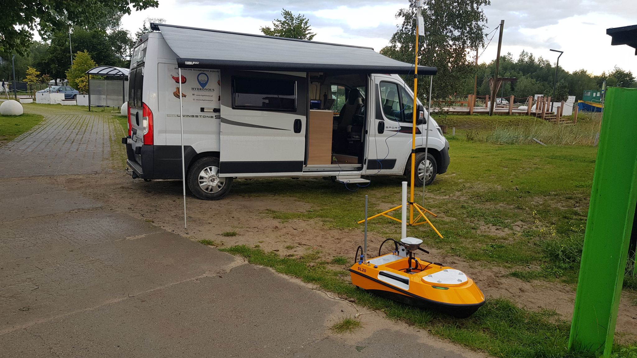 SL20 unmanned surface vehicle transported by a van