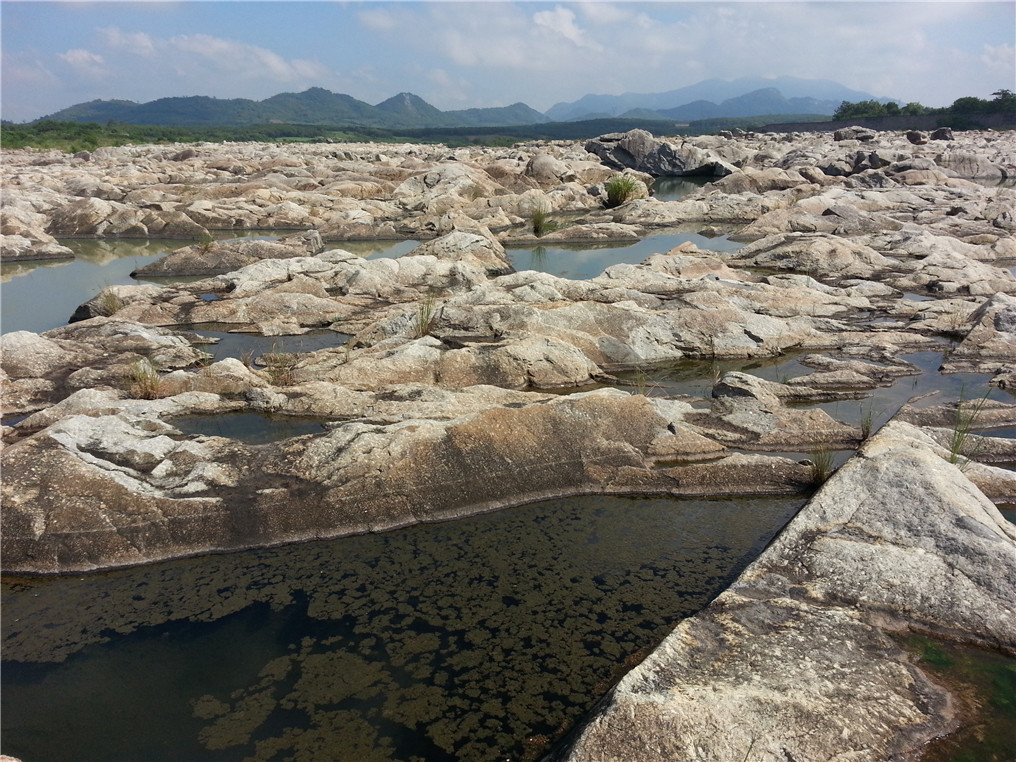 Figure 2. Severely corroded bedrock in front of the dam