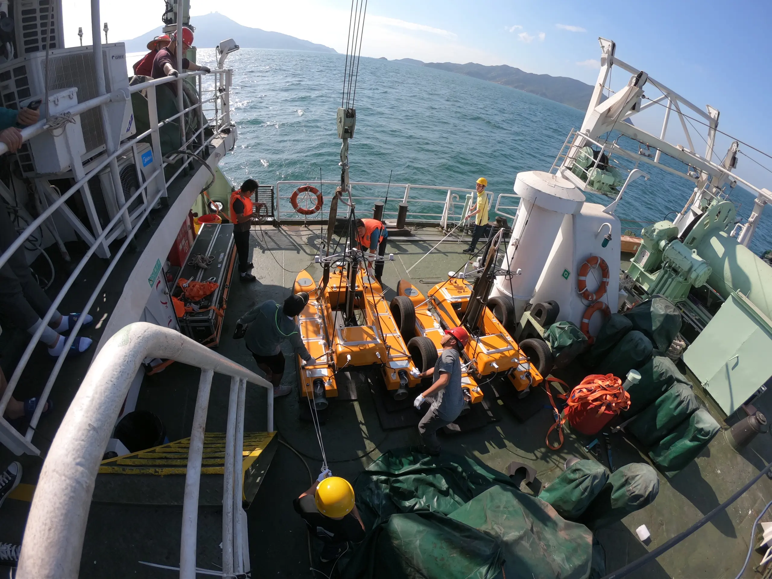 OceanAlpha unmanned surface vessels carry out dynamic ocean observation missions.